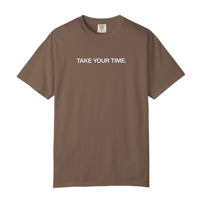 Brown t-shirt with 'TAKE YOUR TIME.' text on a white background